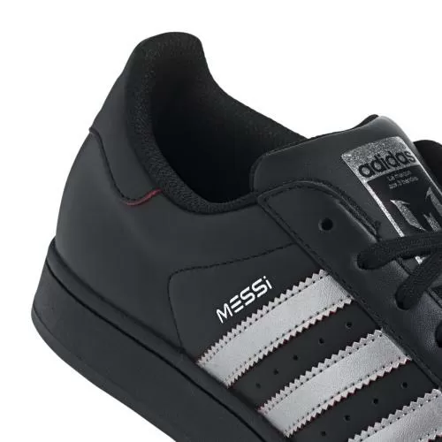 ADIDAS SUPERSTAR MESSI - CBLACK/SILVMT/PURRUB